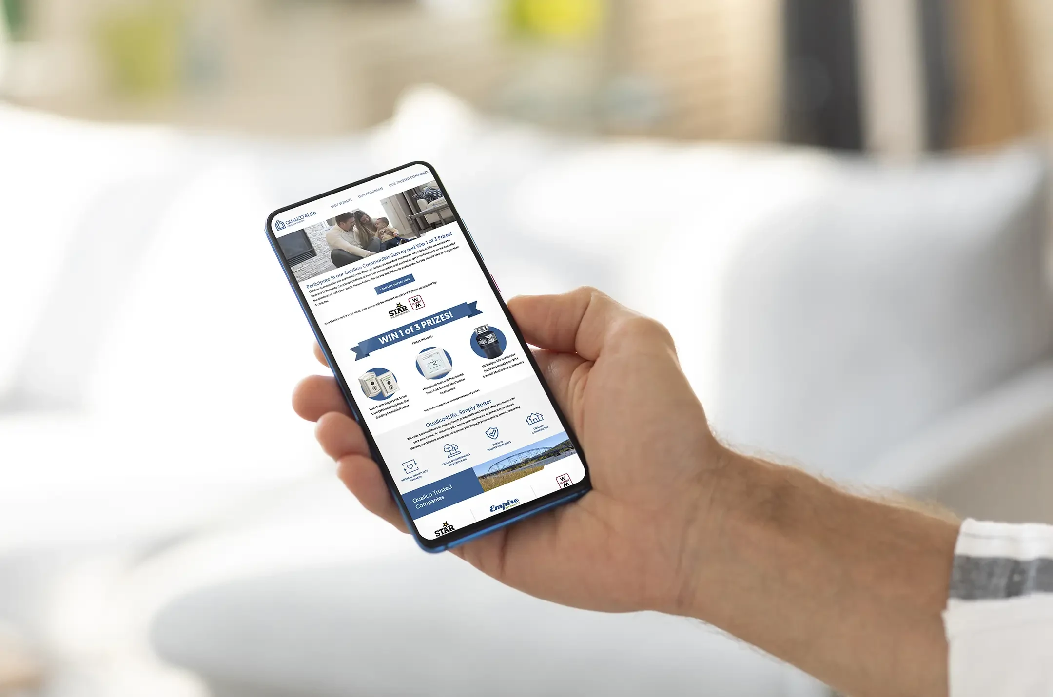 Qualico4Life e-blast shown on a phone, with concierge contest details and offers
